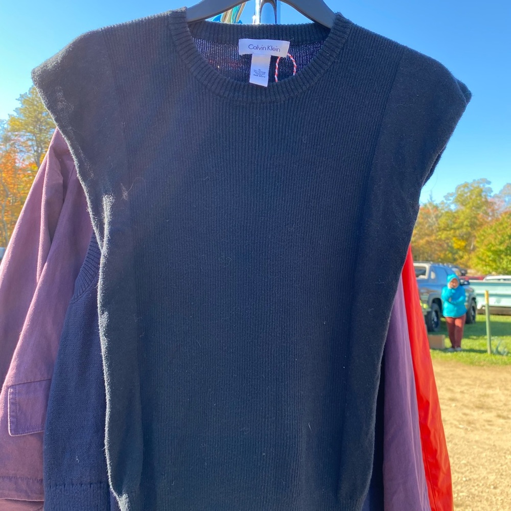 Black Calvin Klein sweater top.